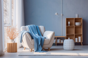 Modern living room with beige, white and blue colors. Minimalistic cozy design with sofa