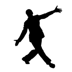 Silhouette of a male dancer in performing pose. Silhouette of a dancing man.