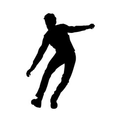 Fototapeta na wymiar Silhouette of a male dancer in performing pose. Silhouette of a dancing man.