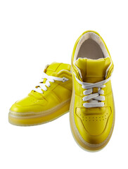 Infinitely beautiful leather sneakers made of canary yellow genuine leather, on a polyurethane translucent sole, with lacing, isolated on a white. - 660356165