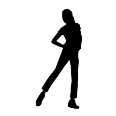 Silhouette of a slim female dance pose. Silhouette of a female in aerobic movement.