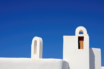 cycladic architecture against a blue sky