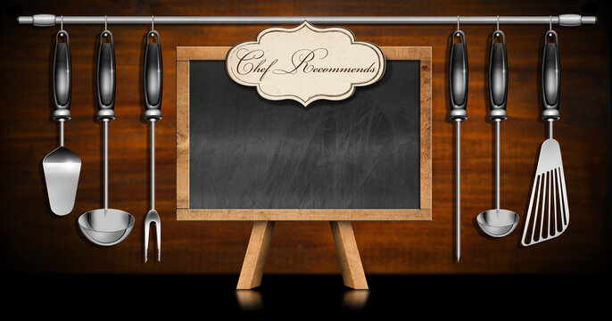 Empty blackboard with wooden frame, easel and a label with text Chef Recommends, set of kitchen utensils made of stainless steel and black plastic on a wooden wall. 3D illustration.