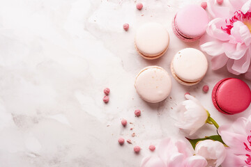 Gourmet dessert featuring delicate macaroons and elegant peony flowers, a luxurious treat.