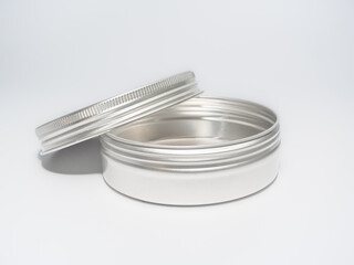 Empty Metal Aluminium screw top tin isolated on a white background