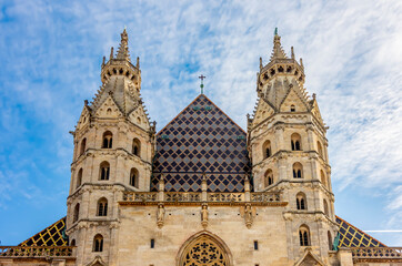 Fototapeta na wymiar St. Stephen's cathedral towers on Stephansplatz square in Vienna, Austria