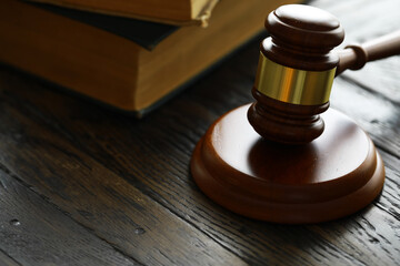 Judges gavel on wooden desk. Law firm concept.