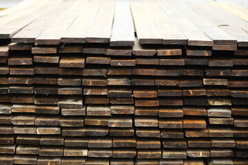 Outdoor lumber storage for the timber industry. Wood processing for both land and water transportation.