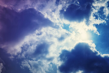 High clouds in the summer sky. Sky background. Meteorological observations of the sky.