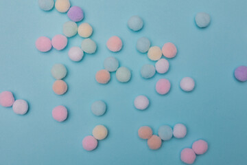 colorful pastel balls on a blue background