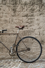 Old bicycle against the wall