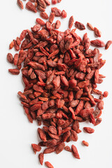 Goji berries on a white background
