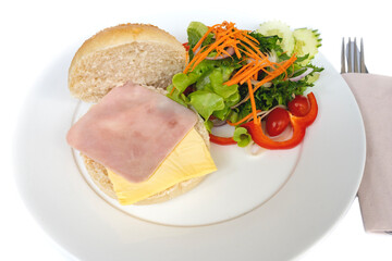 Fototapeta na wymiar Soft brown roll with ham and cheese on white background isolated.
