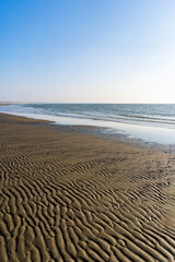 Fototapeta na wymiar Sand Texture Beach. Natural sand texture pattern