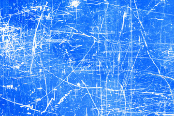 White scratches. Blue paint scratched metal. Peeling paint texture. Grunge background. Brush strokes overlay. Cracked layer.