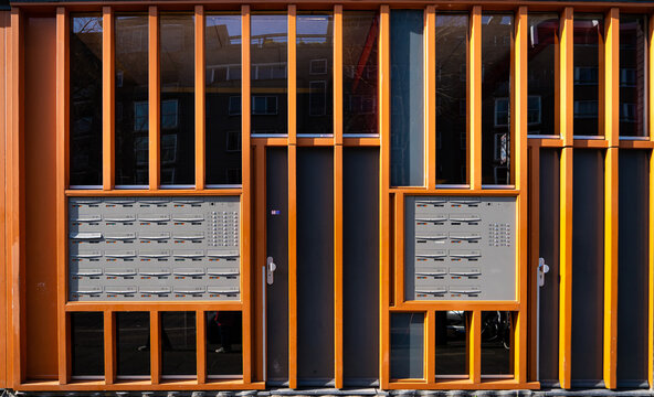 Amsterdam, The Netherlands - March 2022: Many letterboxes, mailboxes in Amsterdam where almost every letterbox has a no no sticker on it