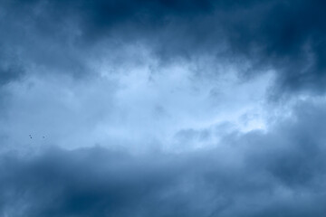 Blue sky with puffy fluffy clouds, horizontal natural background