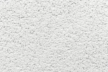 Foto op Canvas White seamless concrete pebble wall background or texture. © Natallia