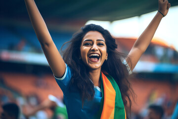 Young girl screaming by showing hand gestures and signs while watching cricket match at stadium. - obrazy, fototapety, plakaty