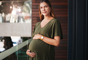 Portrait, pregnant and business woman at her office outdoor balcony at the start of her maternity...