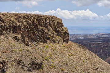 Scenic view of a winding road snaking along a mountain range