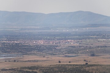Aerial view of the fields of Extremadura and the town of Casas de Donde Pedro in Spain