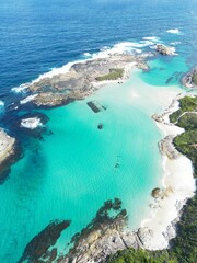 Aerial view of a shore with teal waters in Denmark, Great Southern region, Western Australia - obrazy, fototapety, plakaty
