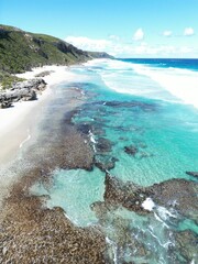Aerial view of a shore with teal waters in Denmark, Great Southern region, Western Australia