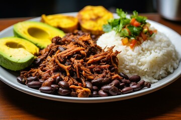 Closeup of Venezuela's national dish with shredded beef, rice, black beans, and fried plantains on a plate. Generative AI