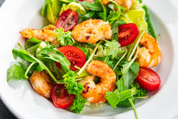 shrimp salad prawn fresh seafood shrimps and arugula appetizer meal Pescetarian food snack on the table copy space food background rustic top view 