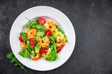 shrimp salad prawn fresh seafood shrimps and arugula appetizer meal Pescetarian food snack on the table copy space food background rustic top view 