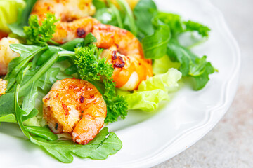 shrimp salad prawn fresh seafood shrimps and arugula appetizer meal Pescetarian food snack on the table copy space food background rustic top view 