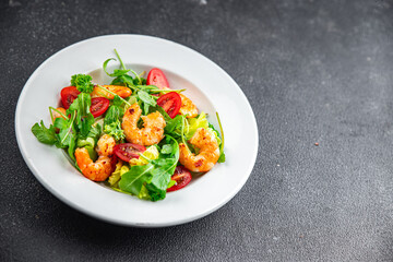 shrimp salad prawn fresh seafood shrimps and arugula appetizer meal Pescetarian food snack on the table copy space food background rustic top view 