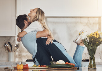 Cooking, hug or happy couple with support or food for a healthy vegan diet, supper or meal together at home. Smile, laugh or woman in kitchen to bond with wellness or man at dinner for lunch or love