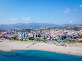 Soverato Italy drone shot of the city with the beach in the foreground
