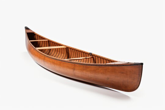 A wooden kayak or canoe isolated on a white background