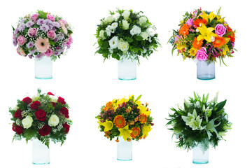 Many beautiful flowers  in several vases.