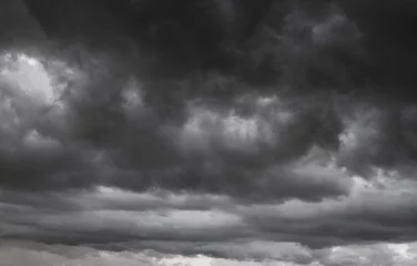 Foto op Plexiglas dark clouds make sky in black. Heavy rain thunderstorm. Pattern of clouds overcast predict tornado, Hurricane or thunderstorm and rainy. Dark sky cloudy have storm and lightning thunderbolt. © BESTIMAGE
