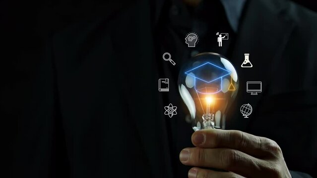 human finger handle the lightbulb, showing many about education icon.