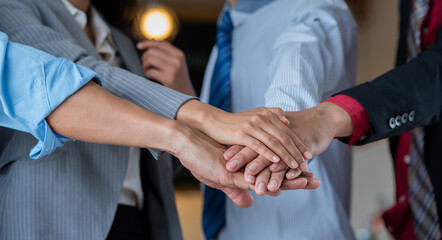 business teamwork putting join hands together. Unity and teamwork show by Stack mix of hands with Spirit diversity solidarity team Partner. Joins hands together teamwork meetings empower.