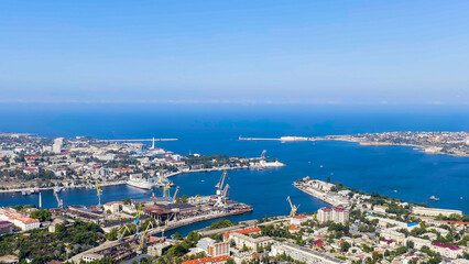 Fototapeta na wymiar Sevastopol, Crimea. Bays of the city of Sevastopol in summer in sunny weather. The ships, Aerial View