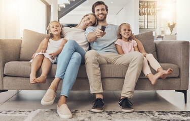 Happy family, relax and watching tv on living room sofa for entertainment or bonding together at home. Mother, father and children smile for fun streaming with remote for series or movie at the house - obrazy, fototapety, plakaty