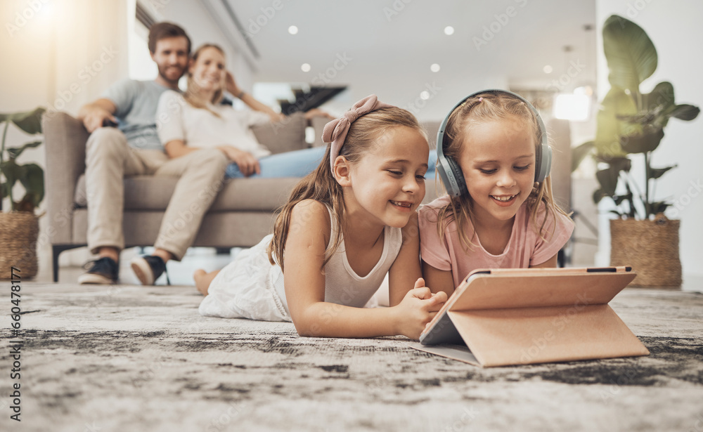 Sticker Happy parents, siblings and children with tablet on floor in living room for entertainment together at home. Mom, dad and kids in lounge with technology for relax, enjoying or streaming at house