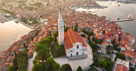 Aerial summer sunrise of Rovinj town, Croatian fishing port on the west coast of the Istrian peninsula. Colorful morning seascape of Adriatic Sea