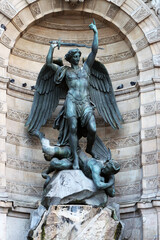 Saint Michel terrassant le Demon statue by French sculptor Francisque Joseph Duret that is located...