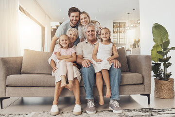 Big family, smile and portrait in home living room, support and bonding together. Happy parents,...