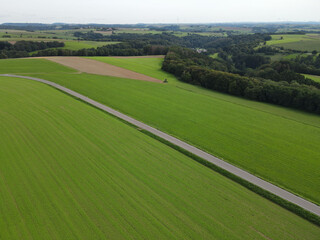 Aerial view of a long rural road in the landscape 