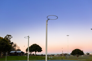 Netball hoops at dusk