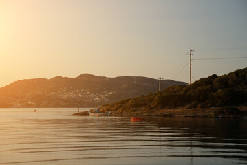 View of seabay with island in Porto Rafti in Greece.