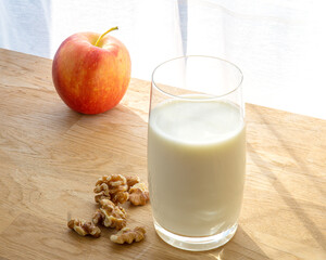 healthy breakfast with milk and apple